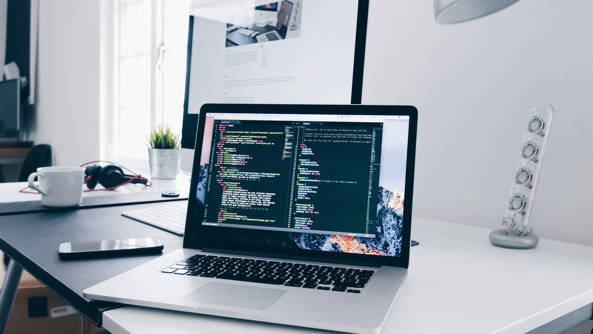 Modern laptop displaying a website design with pricing considerations for UK businesses